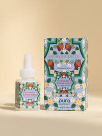 Anthropologie Strawberry & Blonde Wood fragrance vial and packaging on a beige background