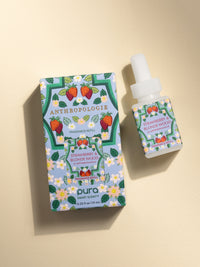 Anthropologie Strawberry & Blonde Wood fragrance vial and packaging on a beige background