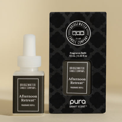 A Bridgewater Candle Company Afternoon Retreat fragrance vial and packaging on a neutral background