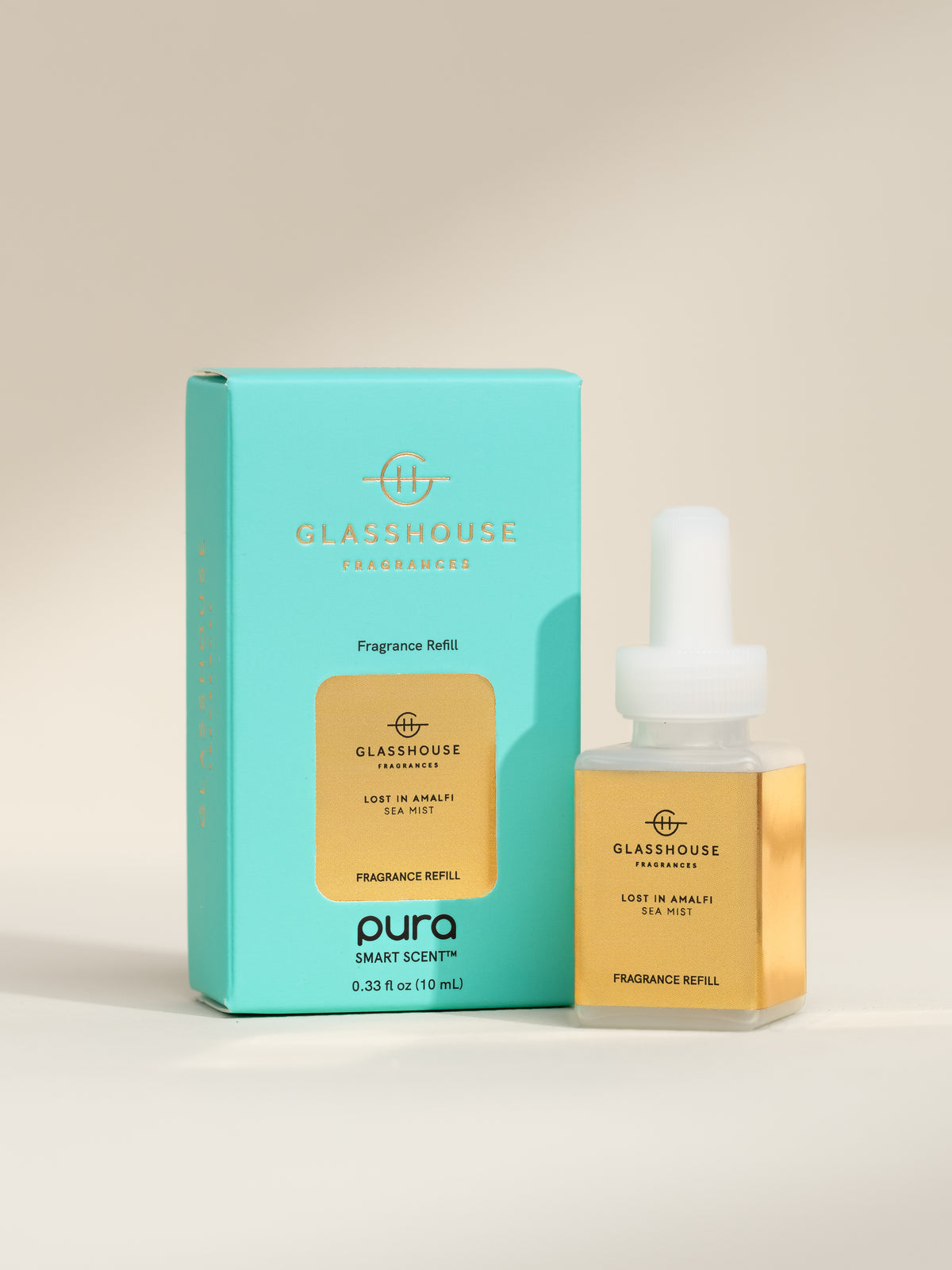 Glasshouse Fragrances Lost in Amalfi fragrance vial and packaging on a beige background