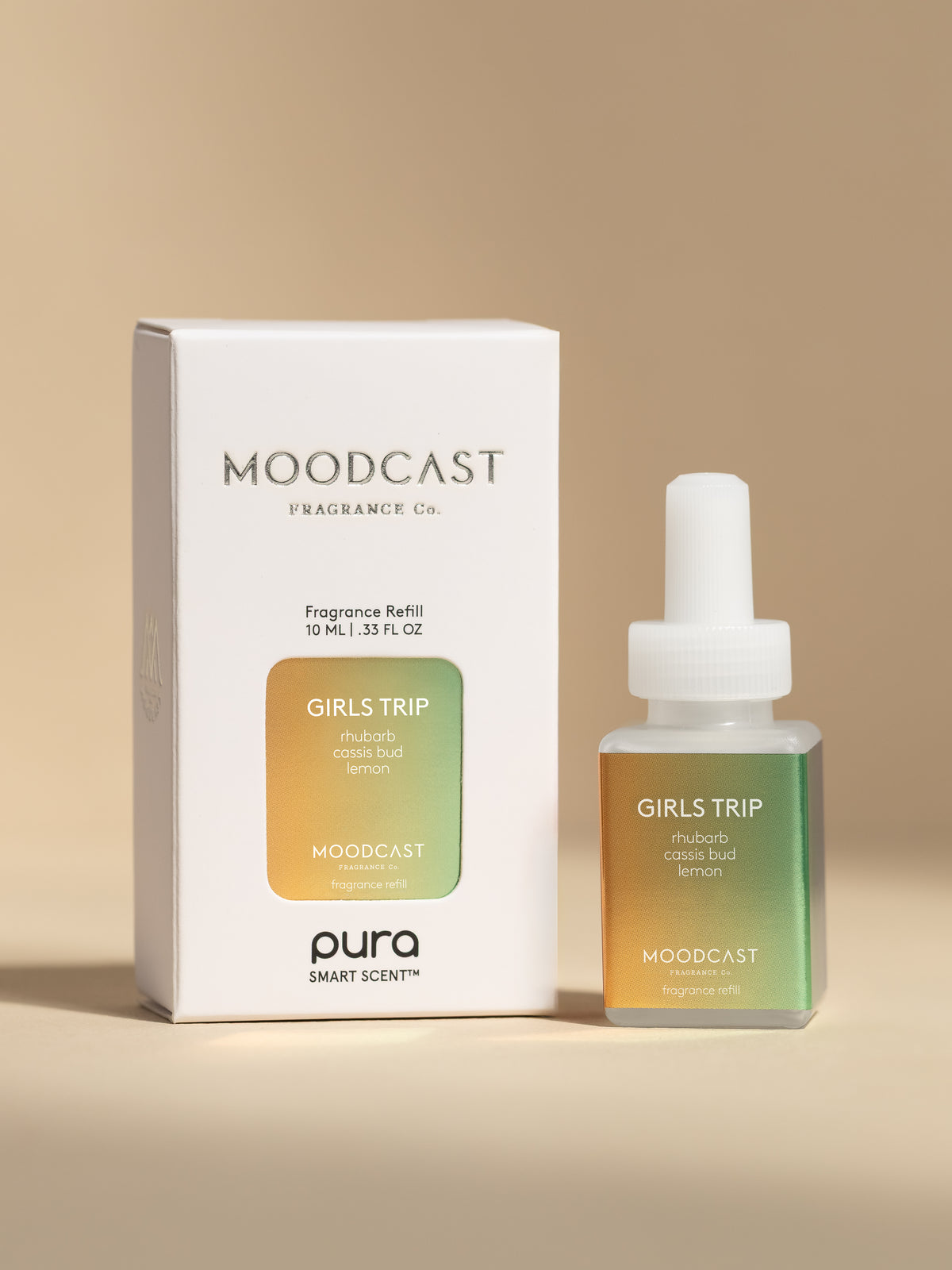 Moodcast Girls Trip fragrance vial and packaging on a beige background