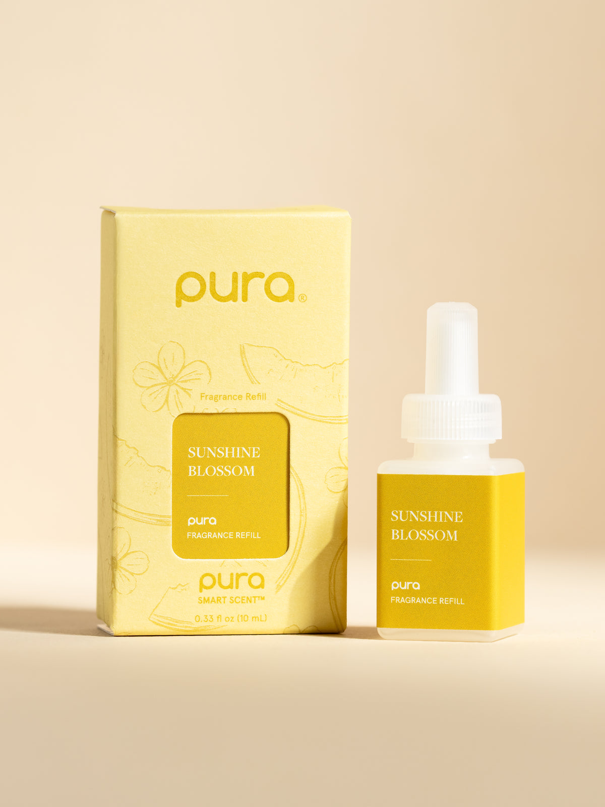 Pura Sunshine Blossom fragrance vial and packaging on a beige background