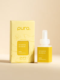 Pura Sunshine Blossom fragrance vial and packaging on a beige background