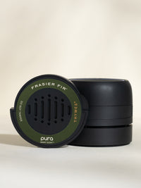 Thymes Frasier Fir car fragrance and Pura car diffuser on a beige background