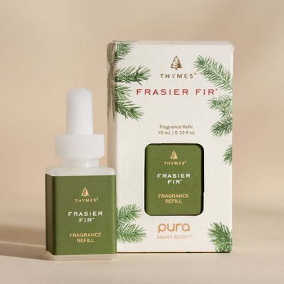 Thymes Frasier Fir fragrance vial and packaging on a beige background
